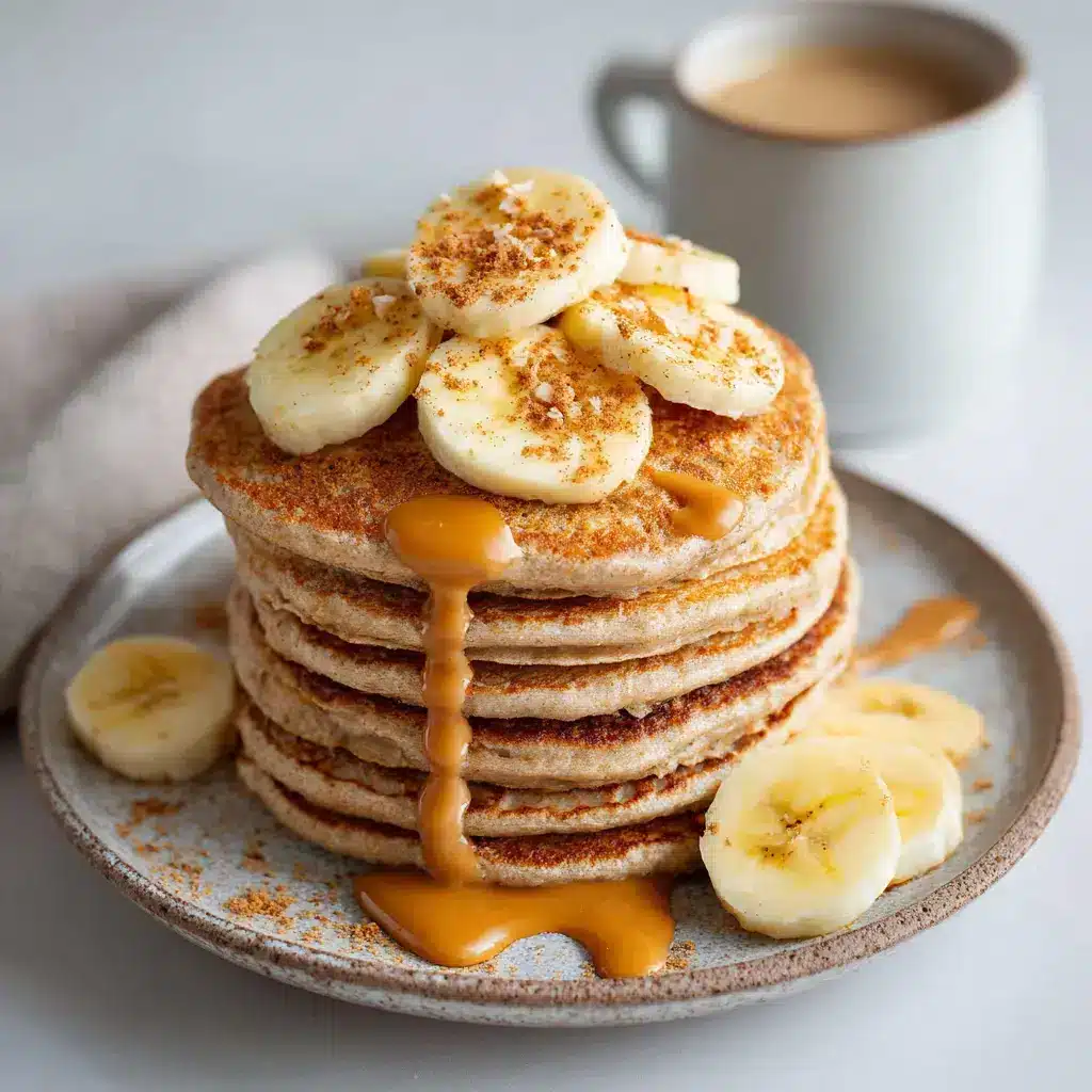 Banana pancake protein recipe that delivers 40g of blissful energy in every bite 2 Banana pancake protein batter being poured into a skillet