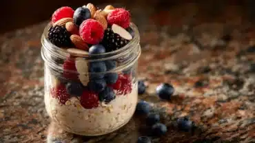 Blended overnight oats topped with fresh berries and almonds