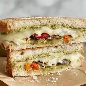 Pesto Breakfast Sandwich: A Vibrant 10-Minute Ritual to Energize Your Morning 4 Pesto breakfast sandwich with egg, cheese, and herbs on multigrain bread